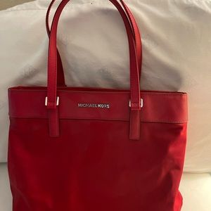 Michael Kors red tote bag.